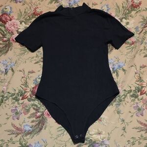 Woman's Black Short-Sleeve One-Piece Bodysuit